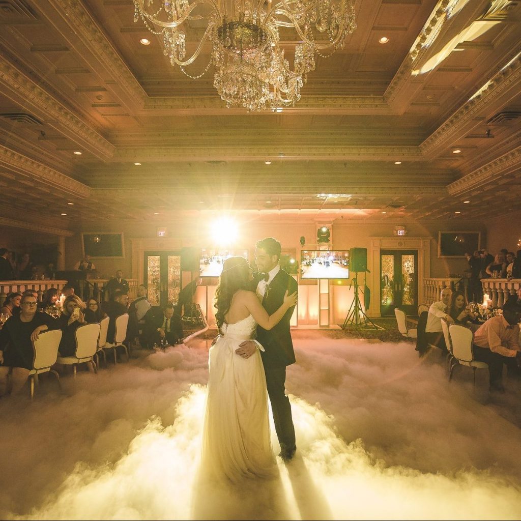 Bride and Groom Dancing on clouds